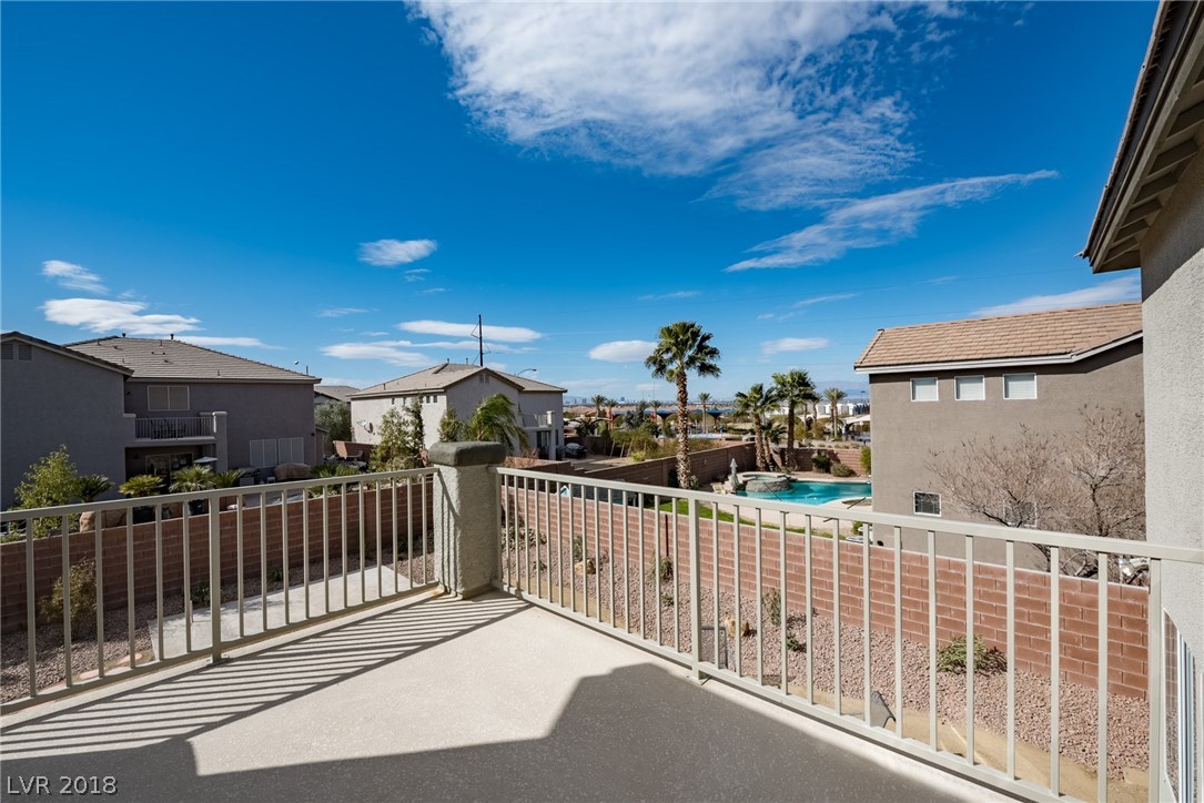 You will be amazed by the views from this master balcony overlooking the city, the Las Vegas Strip, the park and the surrounding mountains.