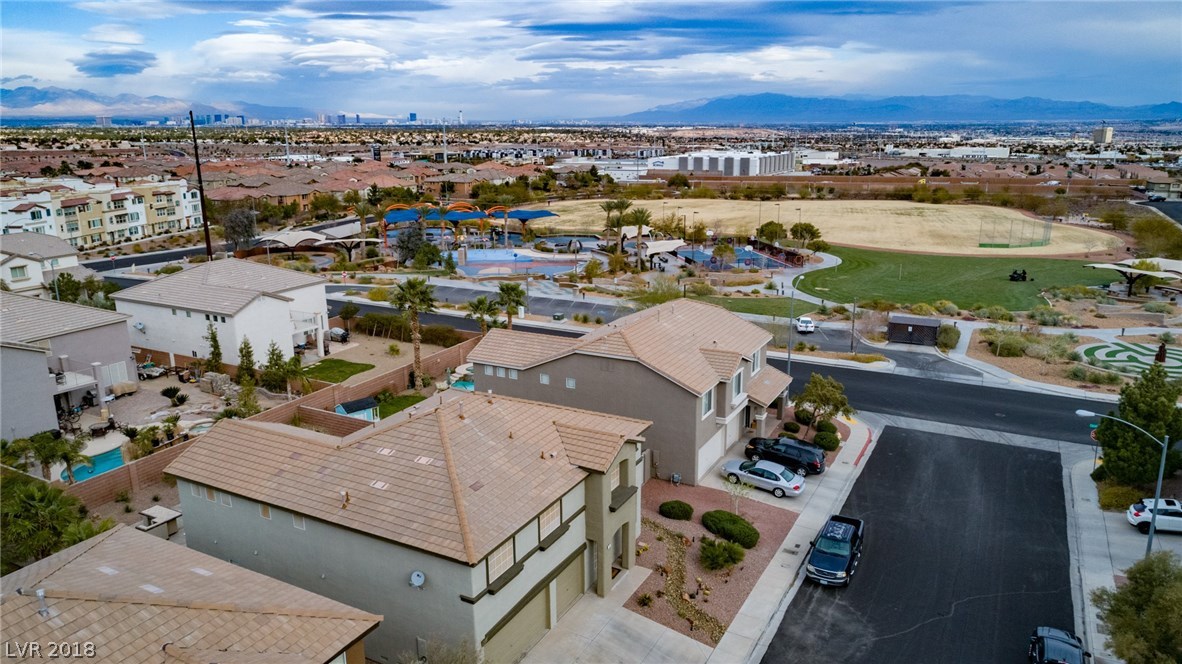 Gorgeous city & Las Vegas Strip view from behind, community Park located just a few door steps away... absolutely phenomenal location very close to freeway, shopping, restaurants, schools, entertainment.