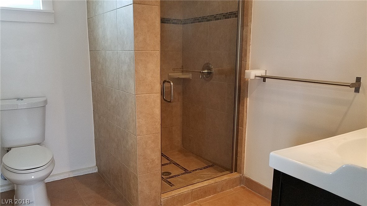 Oh the joy of tile on the floors and shower!  Spacious shower with sturdy tile floor.