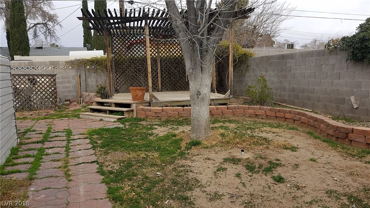 Put down some grass seed and fertilizer and restore this grassy area.  Elevated gazebo is great for parties or performances!  Give it a little TLC and your personal touches and enjoy your space!