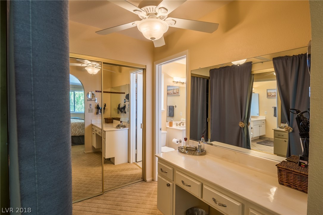 Master bathroom offers 2 closets + large make-up vanity separate from the bathroom section, allowing for more space to move around as well providing privacy for a second person to use the space at the same time.
