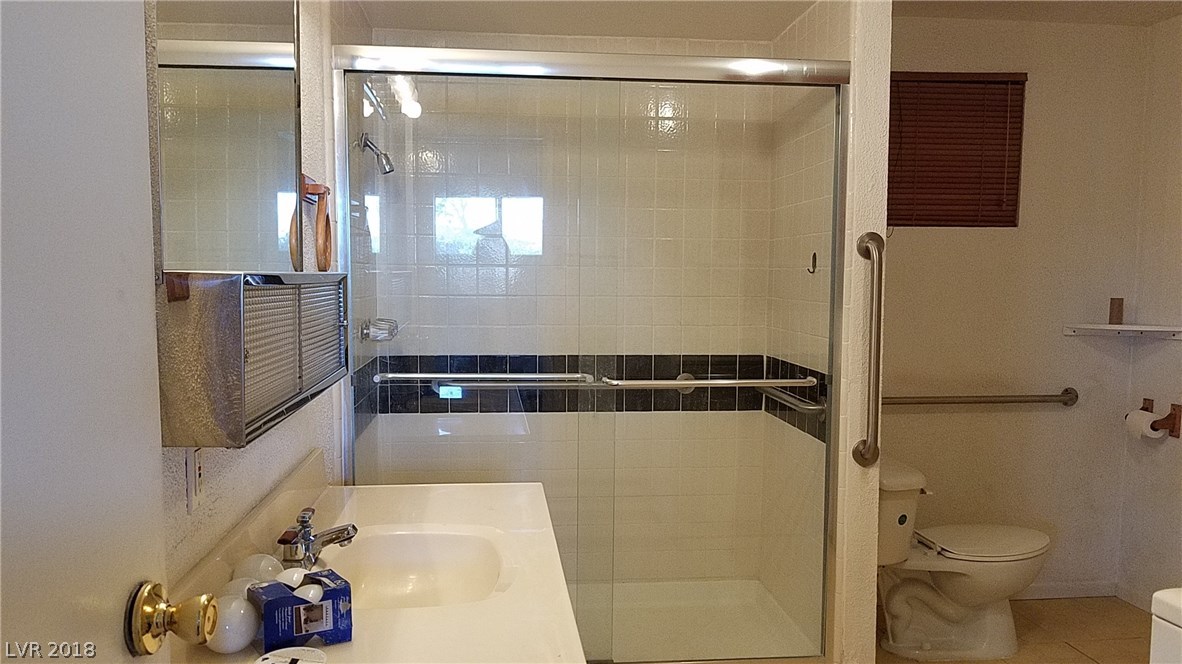 Master bathroom has a modern shower