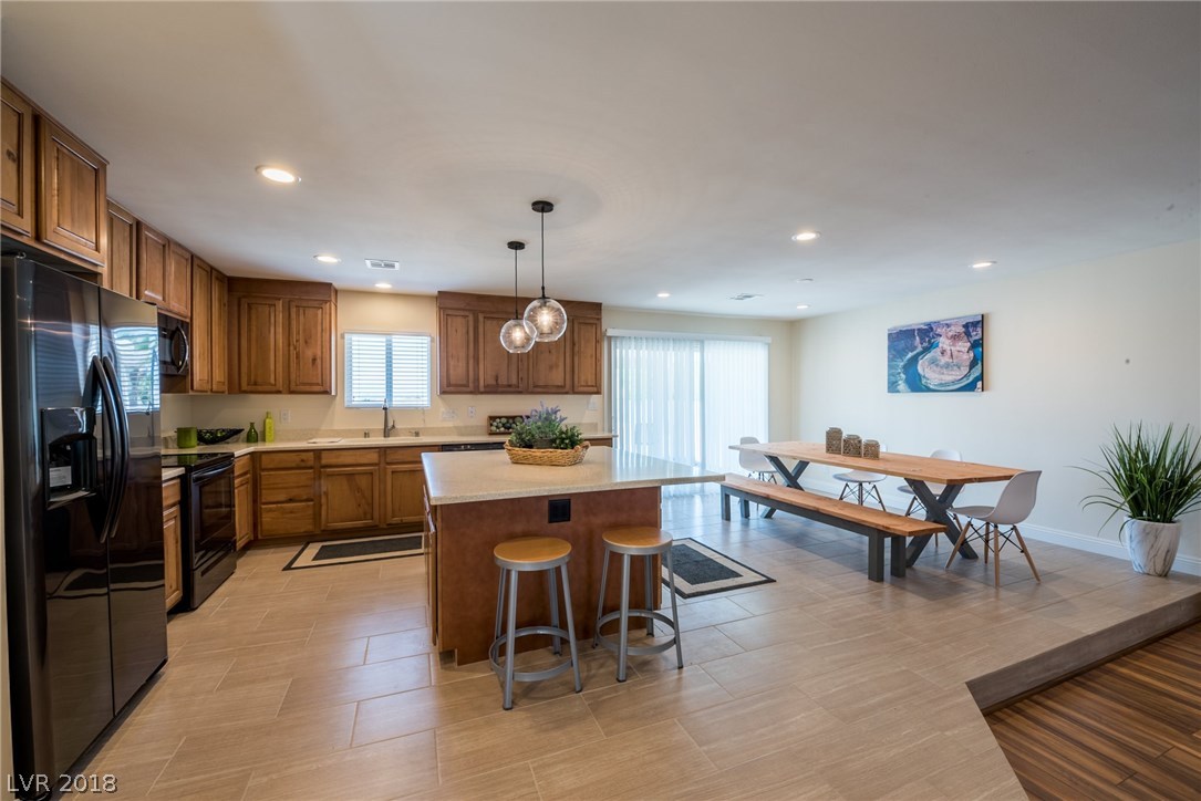 All new appliances, custom lighting & custom tile floors throughout kitchen & dining nook.
