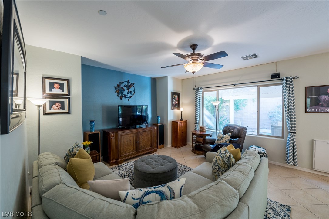 Tile floors are throughout the first floor, including this family room.  The family room is also cable tv ready for when you just want to sit on the couch and enjoy a night of television entertainment.