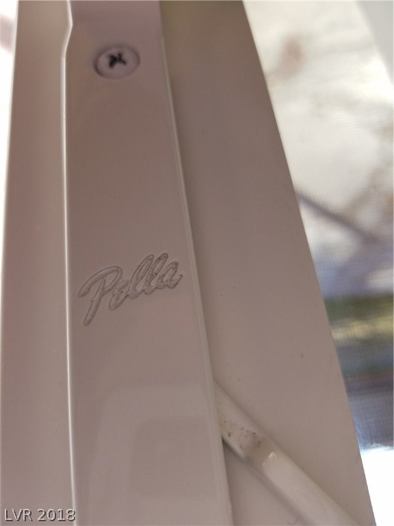 The sliding door to the back patio is made by Pella.  It glides so smoothly!