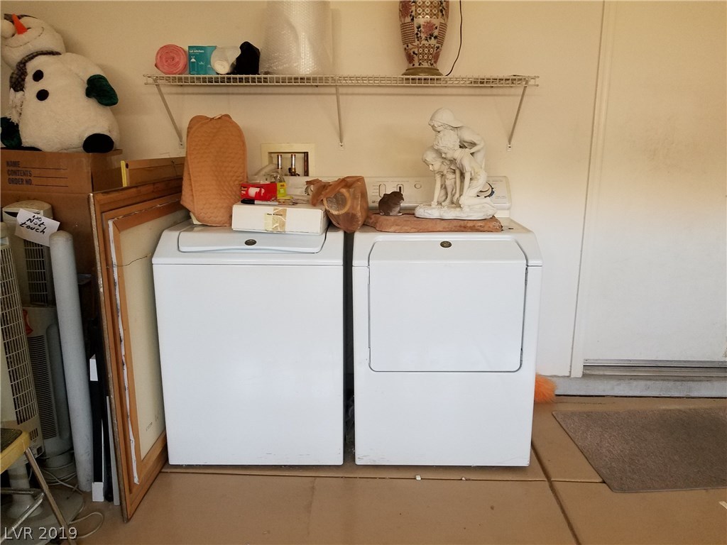 Washer and dryer in garage.  Keep the lint out of the house!