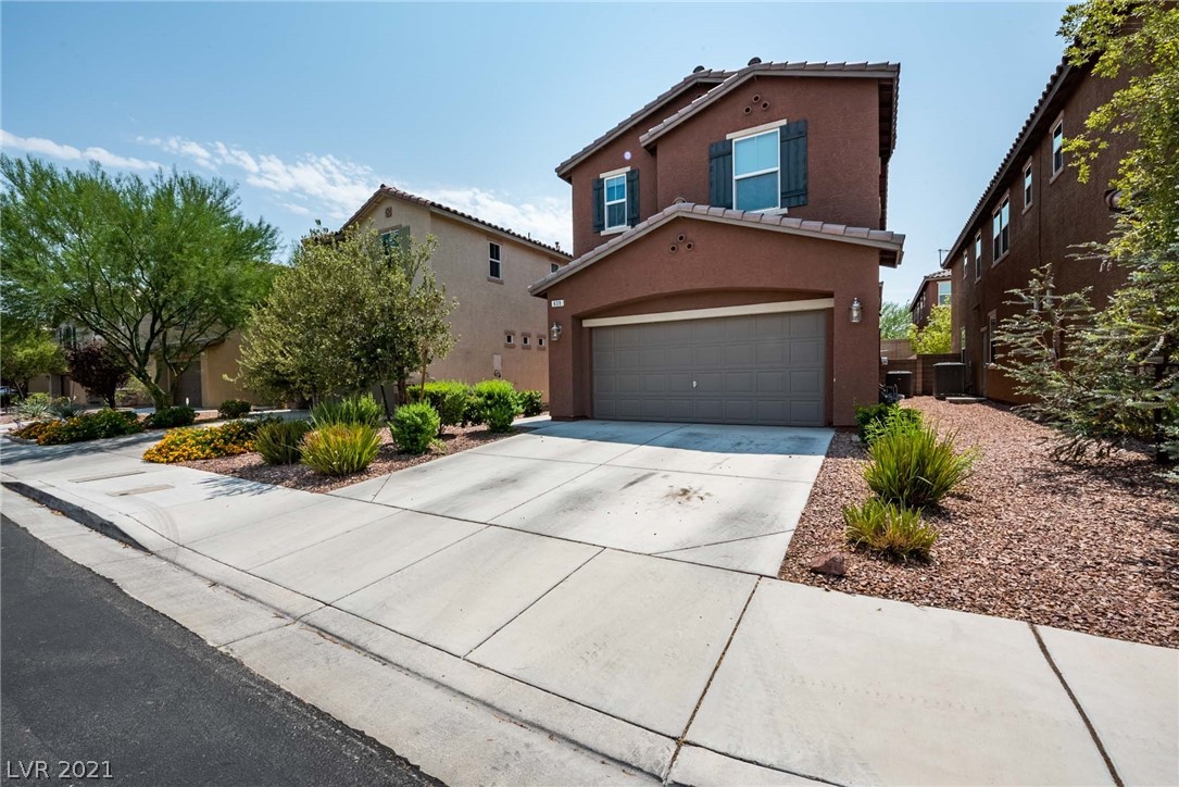 Large exterior front offers large driveway with ample space for parking.
