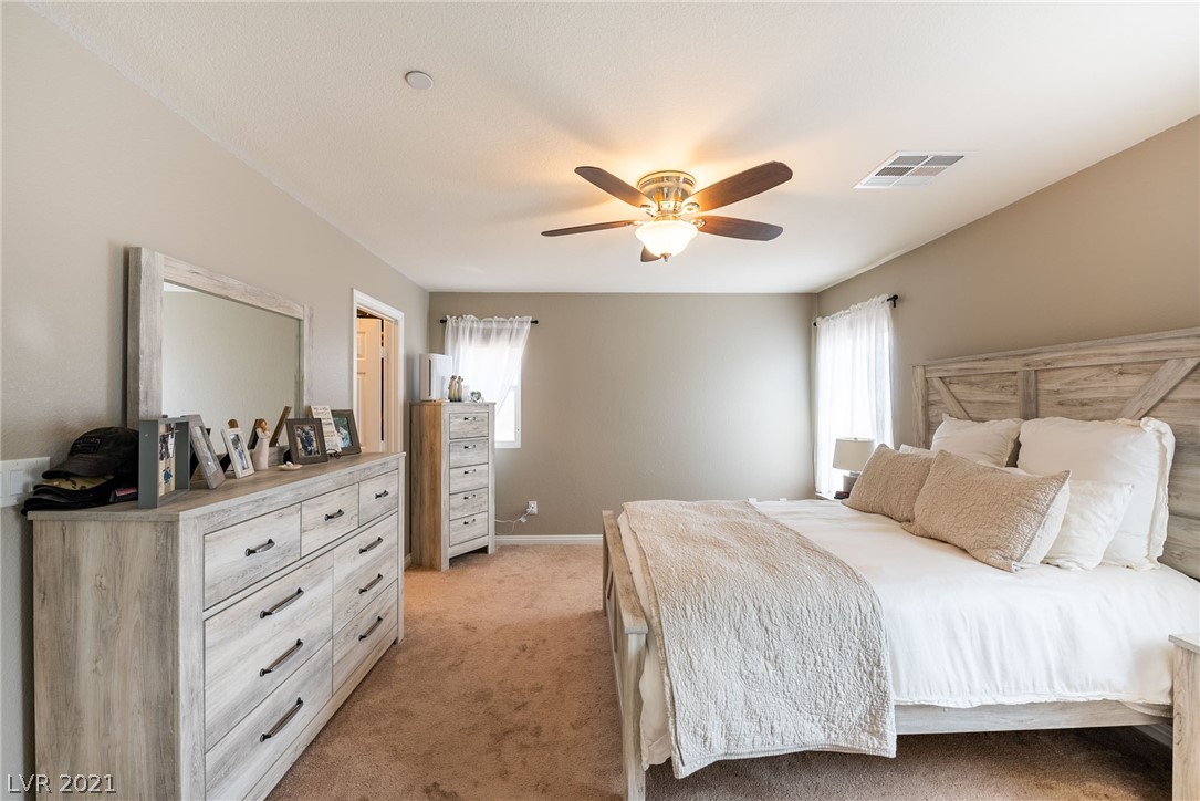 Feel the serenity in this cozy primary master bedroom.