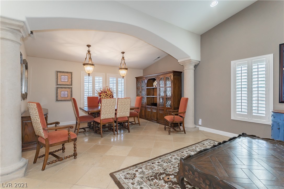 Large formal dining area can accommodate most dining table's for those holiday meals with family & friends! Plantation shutters though out the home let in a lot of natural light flow.