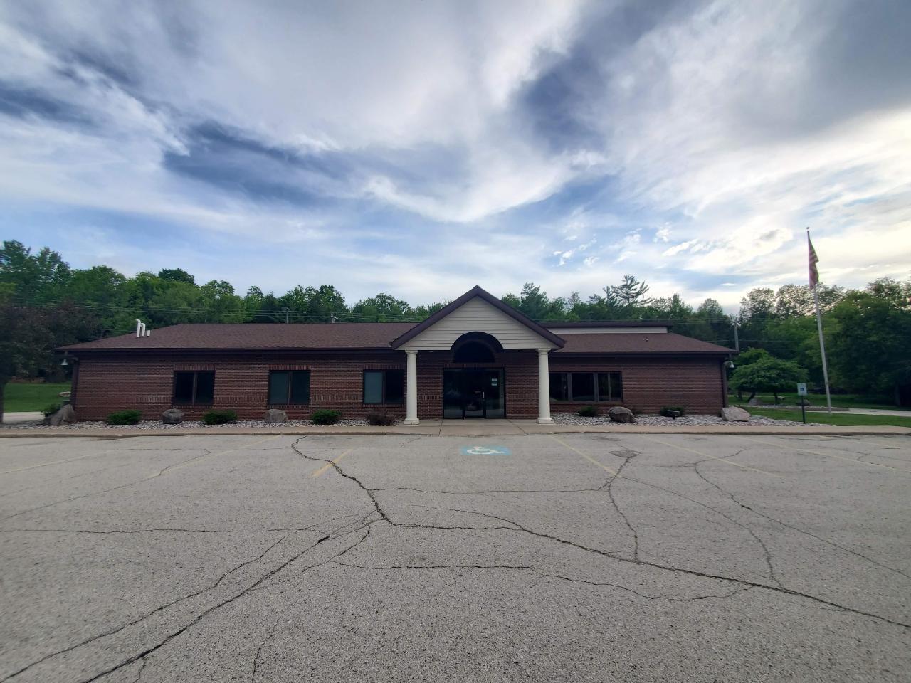EXCELLENT BUSINESS LOCATION - This incredible 3,395 sqft brick-sided building features an updated interior, a main lobby with counter, 5 offices, a conference room, kitchen/ break room, vault, central air, a drive-thru, and alarm system. The property totals 1.80 acres, has 676 ft of road frontage and a paved parking lot with two driveways to County Road N. Possible business uses include dental, medical, daycare, retail and more. Don't miss this opportunity to start your business in this great Northwoods community!