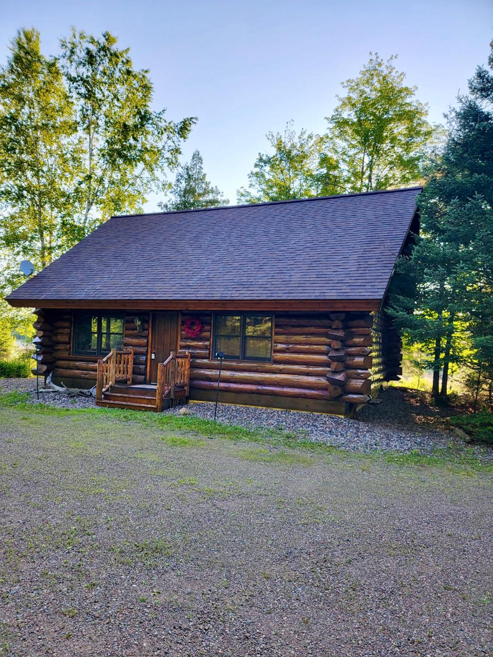 Charming year-round log cabin on the Flambeau River! This 2BR, 1BA home is situated on just over an acre & boasts a large level yard & 300’ of river frontage. Walk into the open concept living area with a new pellet stove for extra comfort in the cooler months. A new AC unit was just installed for use on these hot summer days. There is one full bedroom and bathroom on the main level and a large loft area above providing extra space for family and guests to enjoy your lovely river home. This home has a full basement, partially finished with tons of opportunities for extra recreation/gathering space, an office, etc. There are 2 add’l storage sheds for keeping toys. This place is an outdoor enthusiast’s dream! Float down river or relax & throw a line from the dock. Over 15,000 acres of water, great fishing and tons of fun. Enjoy the secluded feeling of being within nature on the river, yet a short drive to downtown Park Falls. See this place today and start making many memories to come!