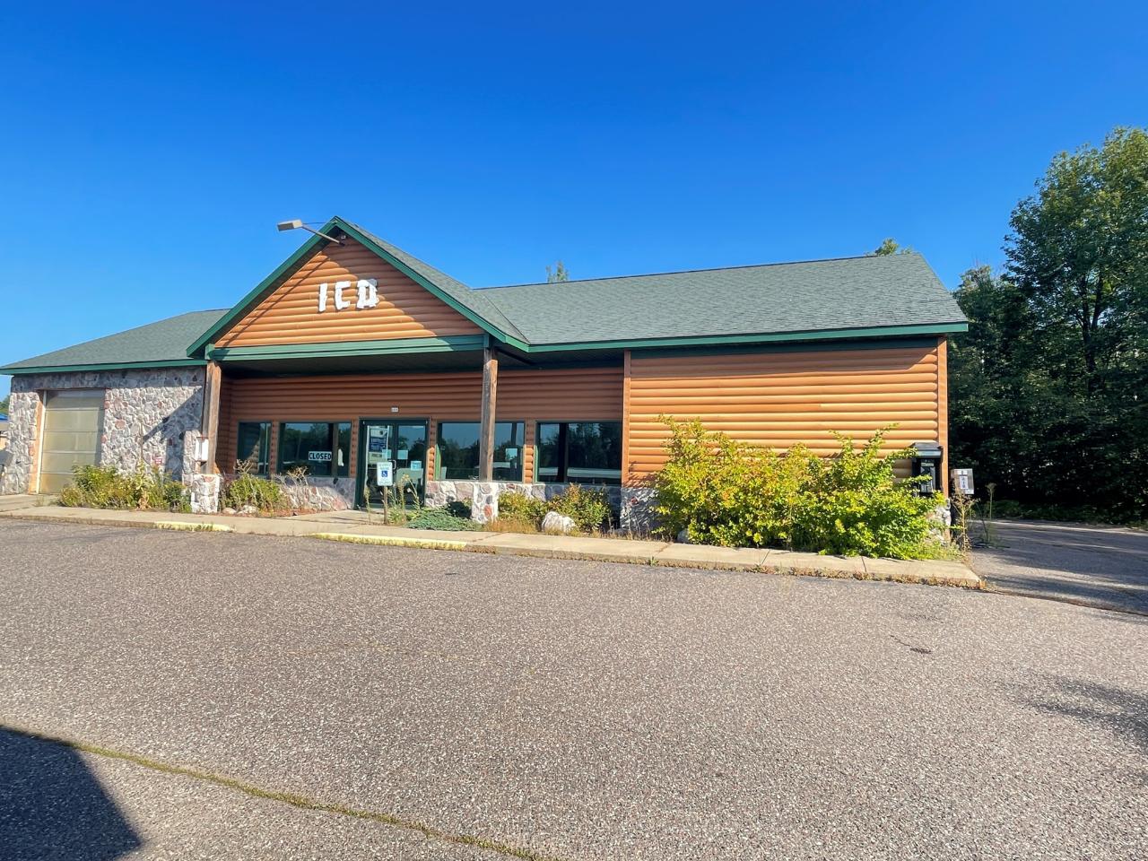 Located on the main entrance to the city of Rhinelander with great visibility. Your business could be here! The parcel has 200 feet of road frontage with a traffic count of 10,500 per day. This commercial space, zoned B-3, has approximately 3200 square feet of building space and could be used for multiple uses. Prior use as a convenience store with large and open front room, 36 x 8 walk-in cooler, office area, fish bait station, and single carwash bay. Buyer to verify square footage and zoning. Buyer to verify square footage and zoning.