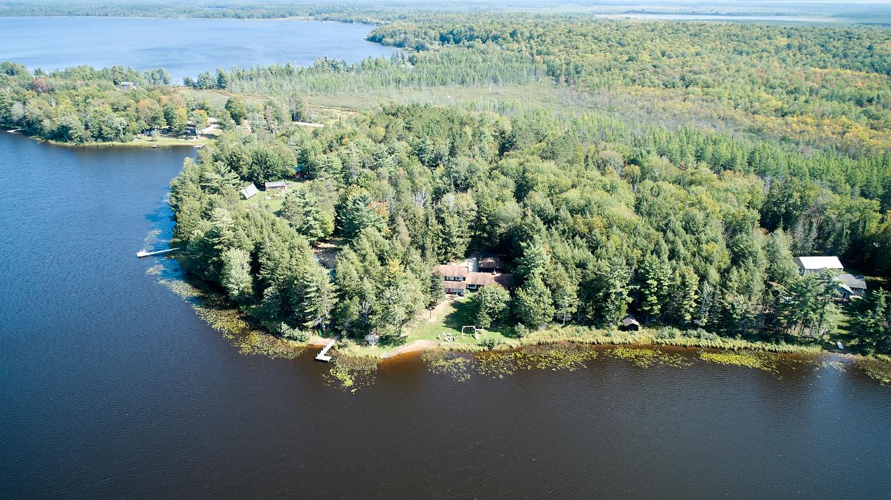 Undocumented Lake Property 7533 Rustic Ln Photo 1