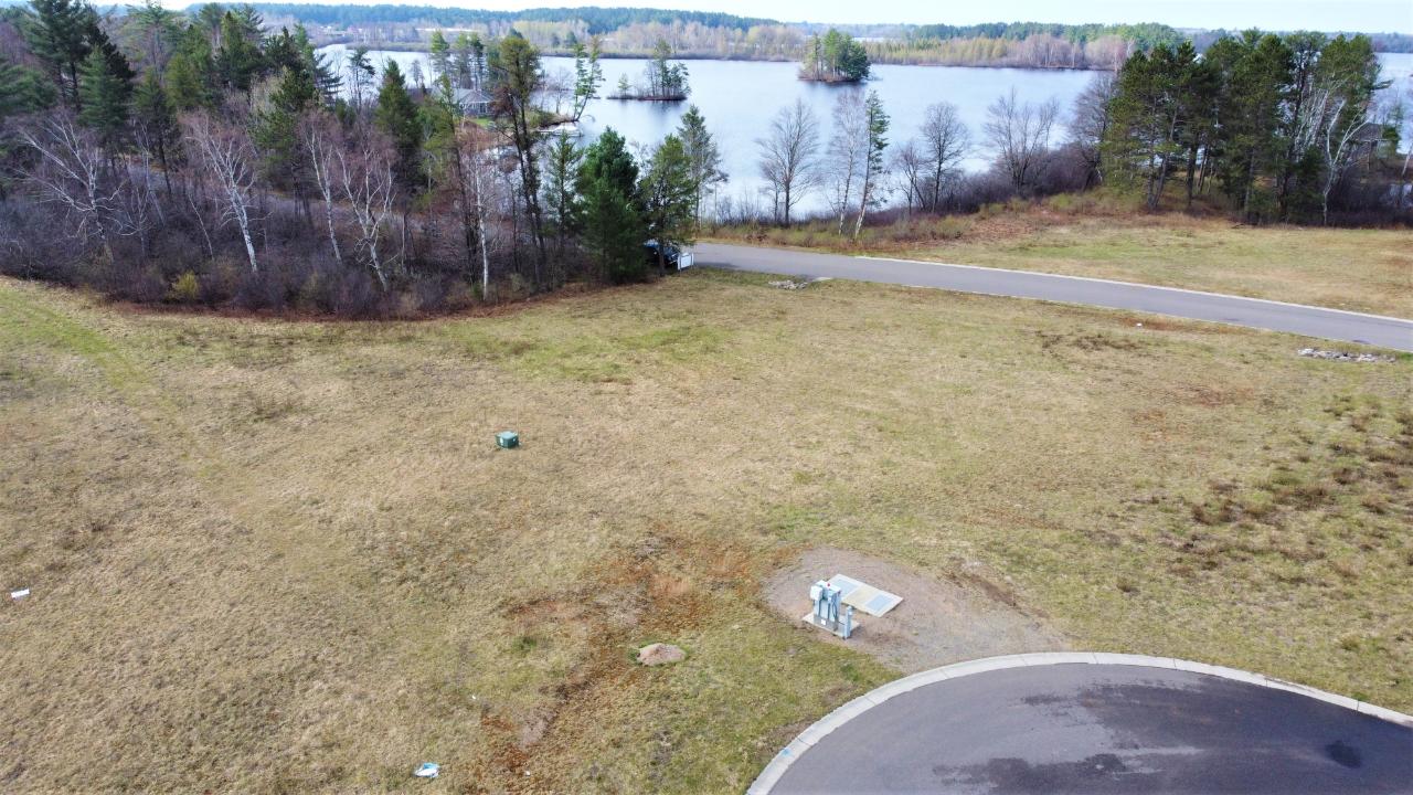 Off-Water lot with a docking slip on Lake Mohawksin, located in a beautiful and quiet subdivision right in the city limits and on a dead end road. The road to each lot is paved and features city sewer and water, electric and natural gas. Lake Mohawksin is known for its picturesque views, excellent Muskie fishing, and top-notch eateries. Come and build your up-north dream home or cabin today! Call today for your showing!! Buyer to verify all Data.