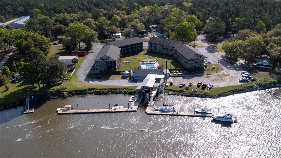 Don't Miss This Rare and Incredible Lifestyle Opportunity Turn Key Full Service Marina Business and Property with 325 Feet On Deep Water on the North Newport River Situated on .76 Acres and Just 6 Miles off the Intracoastal Waterway! New Lift Hoist, Gas or Diesel Fuel and a Marina / Store Built in 2021 Has Everything You Will Need for Your Fishing Trip or a Fun Day on the Water! Dry and Wet Boat Storage Available and the Sale Includes 2.74 Acres On Kings Rd. Currently 80 Dry Storage Units and with Available Space for More or Other Opportunities! Endless Possibilities For Expansion of Docks, Dock Space and Storage! Fishing Charters Available, and Kayaks Welcome! Must See In Person to Truly Appreciate all it Has to Offer! Check Out Our Virtual Tour Above! NO FLOOD INSURANCE!