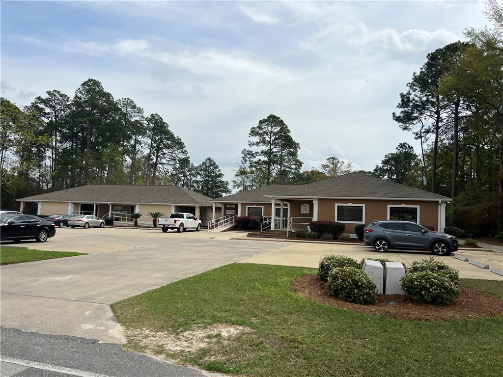 Great opportunity to own a commercial property in Jesup, GA. This property offers two buildings and a cleared lot with endless potential. The two structures have a total of 3 income producing rentals. Unit 121 is 2,224 sqft, unit 131 is 1,302 sqft and unit 135 is 3,436 sqft. Each unit is under a long-term lease as three separate medical offices. The Property should not be disturbed at any time during business hours or without listing agent consent. Additional rental information is available upon request.