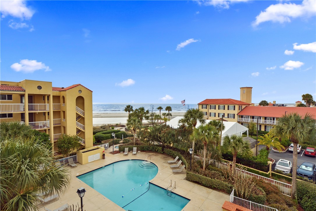 GORGEOUS OCEAN VIEWS in this 4th floor 2 bedroom, 2 bath condo in the King and Prince historic resort! Overlooking one of the three outdoor swimming pools and just a short walk to the beach. Dine at the on-site restaurant or walk one block to several of the best dining options on St Simons Island. Sliding glass off of the living room opens up to a patio overlooking the pool and the beach. Wonderful opportunity to have an investment property on the beach or enjoy as a second home! Covered parking, an owner’s storage closet for beach chairs, and gated access. currently in rental program