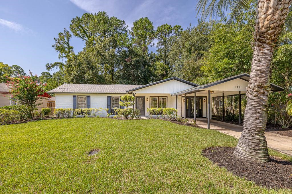 A must see!  Completely remodeled and gorgeous through and through!  New roof, new electric, new HVAC with newer windows and newer doors.  Enjoy cool breezes on the large screened in porch with everything new inside.  Central to movies, shopping and restaurants.  Good living starts here!