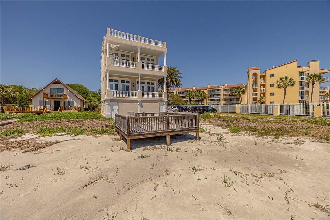 Do not miss this fully furnished custom built beachfront home that is located right next door to the King & Prince! Wake up every morning to views of the ocean from the master suite and the living room! The custom-built kitchen is state of the art with every detail thought-out. This home offers 4 bedrooms and 4.5 bathrooms. Additional features include a side veranda with a built-in gas grill, a wet bar/wine cooler/ice maker, travertine floors, a gas fireplace, a private stairwell/elevator, a two-car garage and more! This unit has a brand-new roof, fresh paint, and new Travertine floors throughout the bedrooms. Tons of extra space for storing beach toys, surf boards, etc. There are only two units in this building. This is a one-of-a-kind property. Great rental investment income. There is no HOA! Sellers are licensed Brokers in the State of Georgia. #245963 & #174937