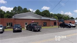 Here is your opportunity to own your very own building to start your own business.  This 27,000 square foot building is split in to 4 different sections.  Currently the main section is an auto customization business and the other 3 sections are rented out for $3050 al together.  There are 2 offices and 2 showrooms.  It has tons of warehouse space.  Currently there is almost 15000 square feet that is climate controlled.  Call today to set up a showing.