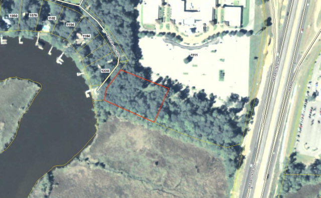 This 2 acre commercial tract visible from I-95 would make an incredible restaurant site with views of the water and marsh. It also could potentially be made a part of a beautiful neighboring residential development with the proper approvals and could potentially have a dock leading out into the Cathead River. There is potential for having the property rezoned as residential with two to three residential lots that would have water and marsh views.