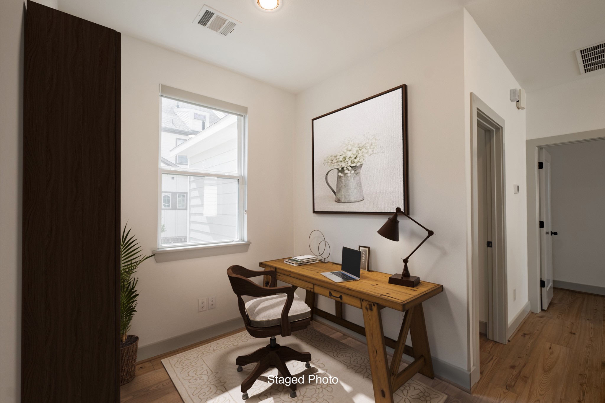 Upstairs at the top of the stairwell is this great study nook - it could serve as a second office, a primary office