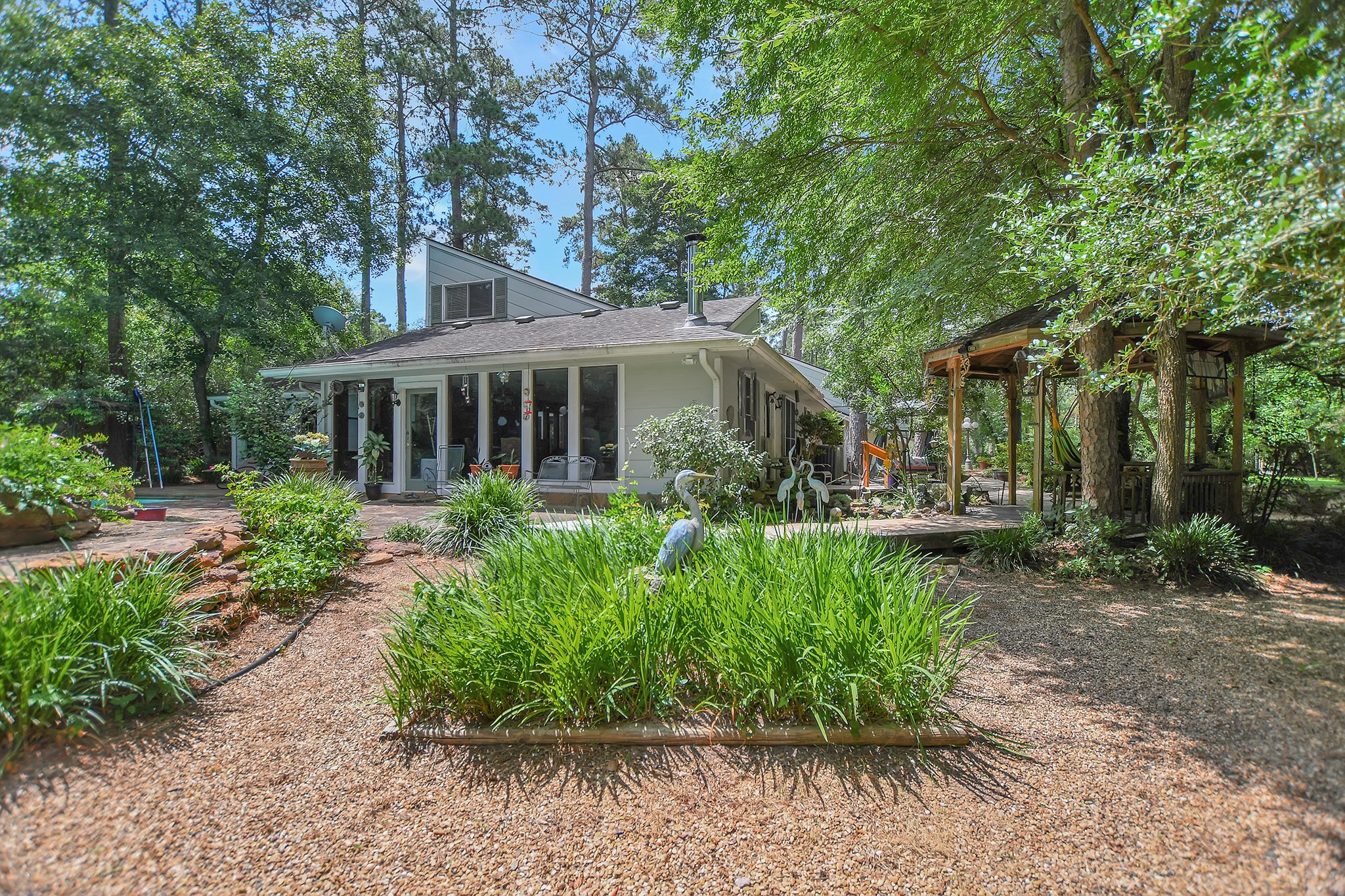 Welcome home to 14510 Decker Drive - located near the end of a dead-end street on 1.9 acres in a restricted neighborhood (with no HOA) plus 15.3+ unrestricted acres!