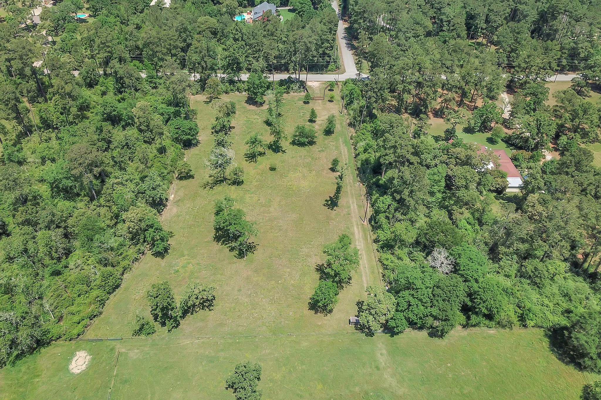 Birdseye view of 3 acre tract from rear of property facing Stagecoach Rd.