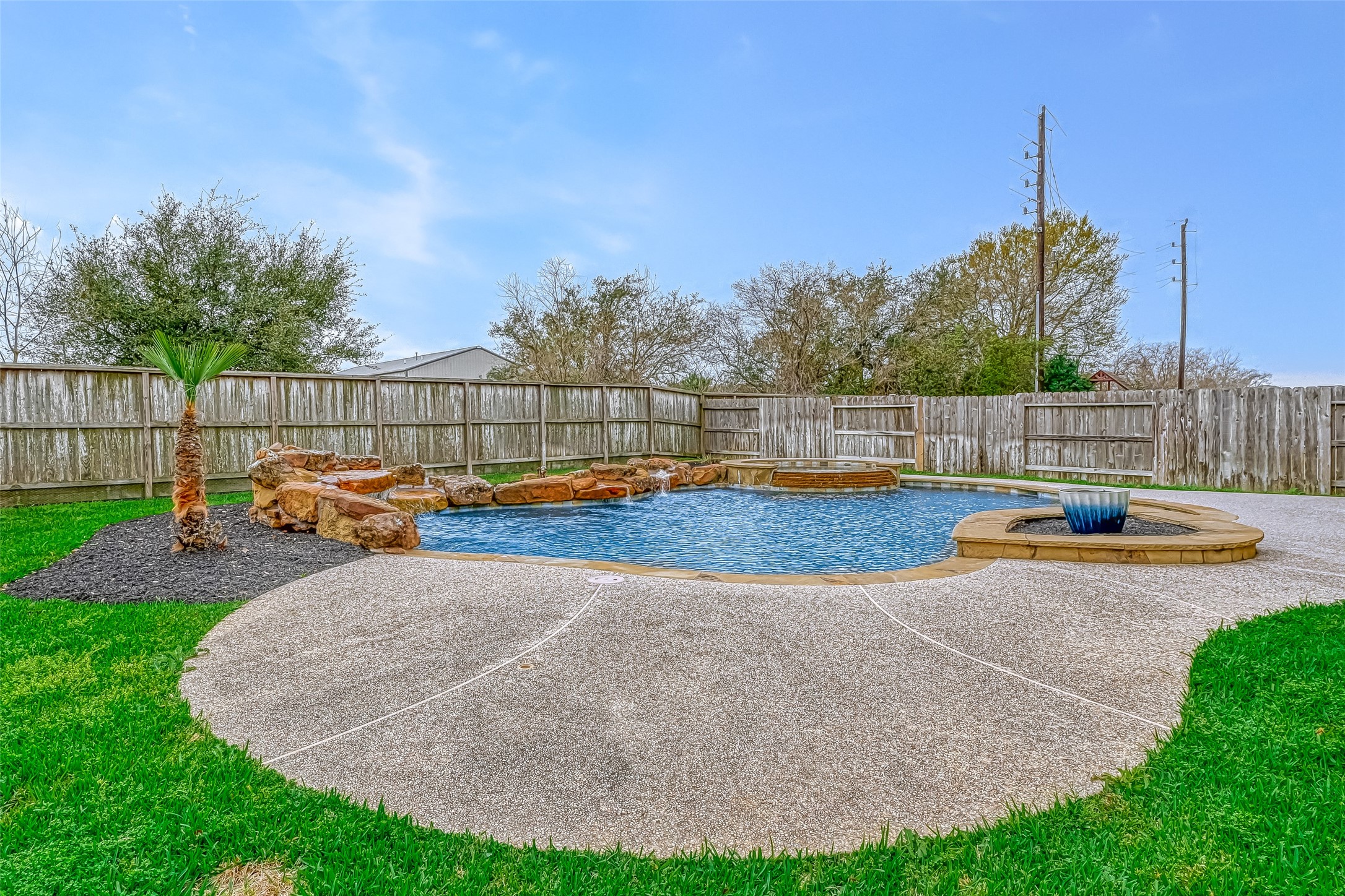 Gorgeous pool and spa with rock water features.  Great space to cool off and relax!!
