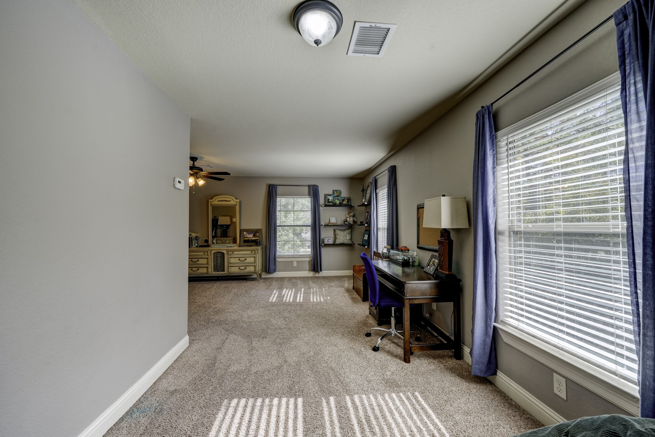 Another view of this incredible space! There's room for an amazing game room with space for pool table and gaming area OR create a teenager's dream bedroom!