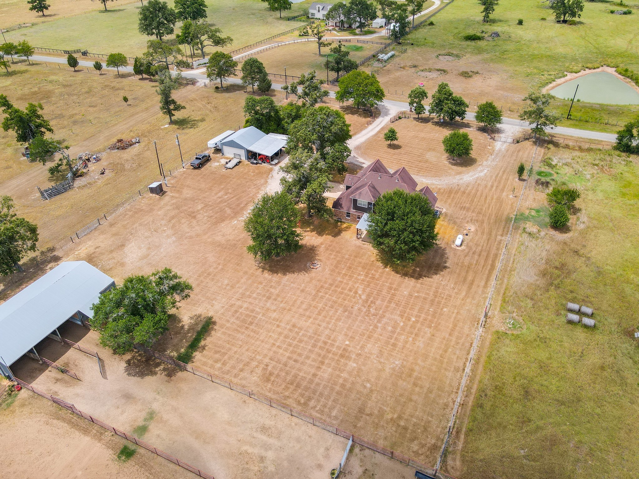 Gorgeous almost 25-ACRE+- Cross-Fenced Equestrian Estate is Move-In Ready. Surrounded by Large Ranches on a Peaceful Cul-de-Sac Street. Complete w/ a 40x60 Barn w/Living Quarters (Kitchen, Bedroom, Full Bath & W&D Hook-ups), 3-Horse Stalls, Tack Room, 4-FFA/4-H Pen Stalls, Loft Storage, Riding Arena, 2 RV/Trailer Hook-Ups w/Septic, Water & Electric, plus a 30x40 Storage/Workshop Bldg.