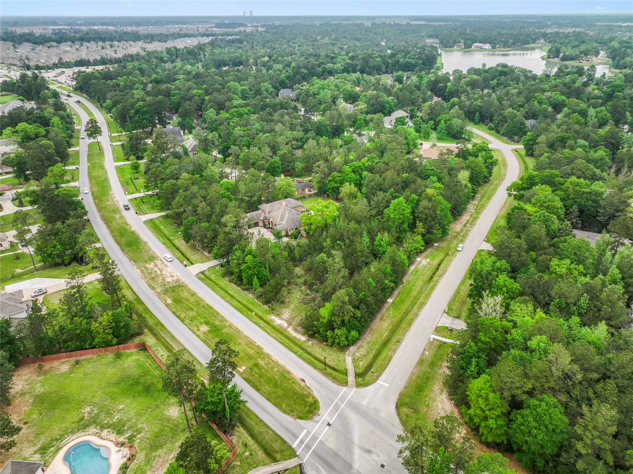 Stunning, wooded 1+acre Corner lot perfectly located in the heart of the prestigious and exclusive community of Benders Landing.