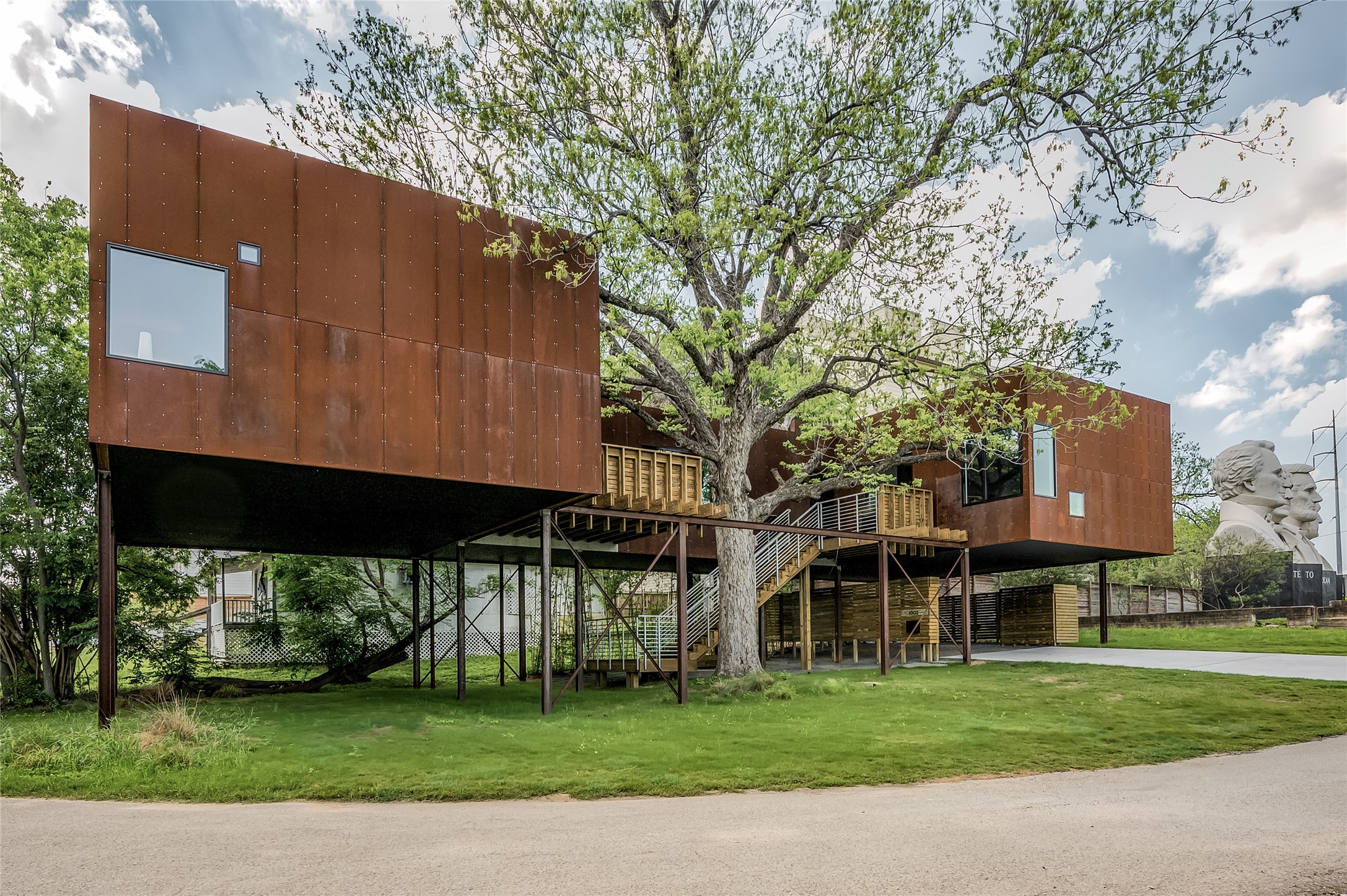 An urban treehouse wrapping a magnificent 200-year-old pecan tree, 1002 Edwards is architecture as art, designed and built by Scott Strasser.