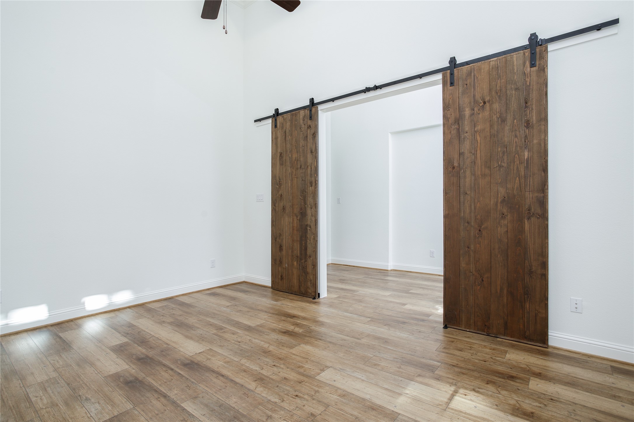 Double barn style door entrance to home office/study.