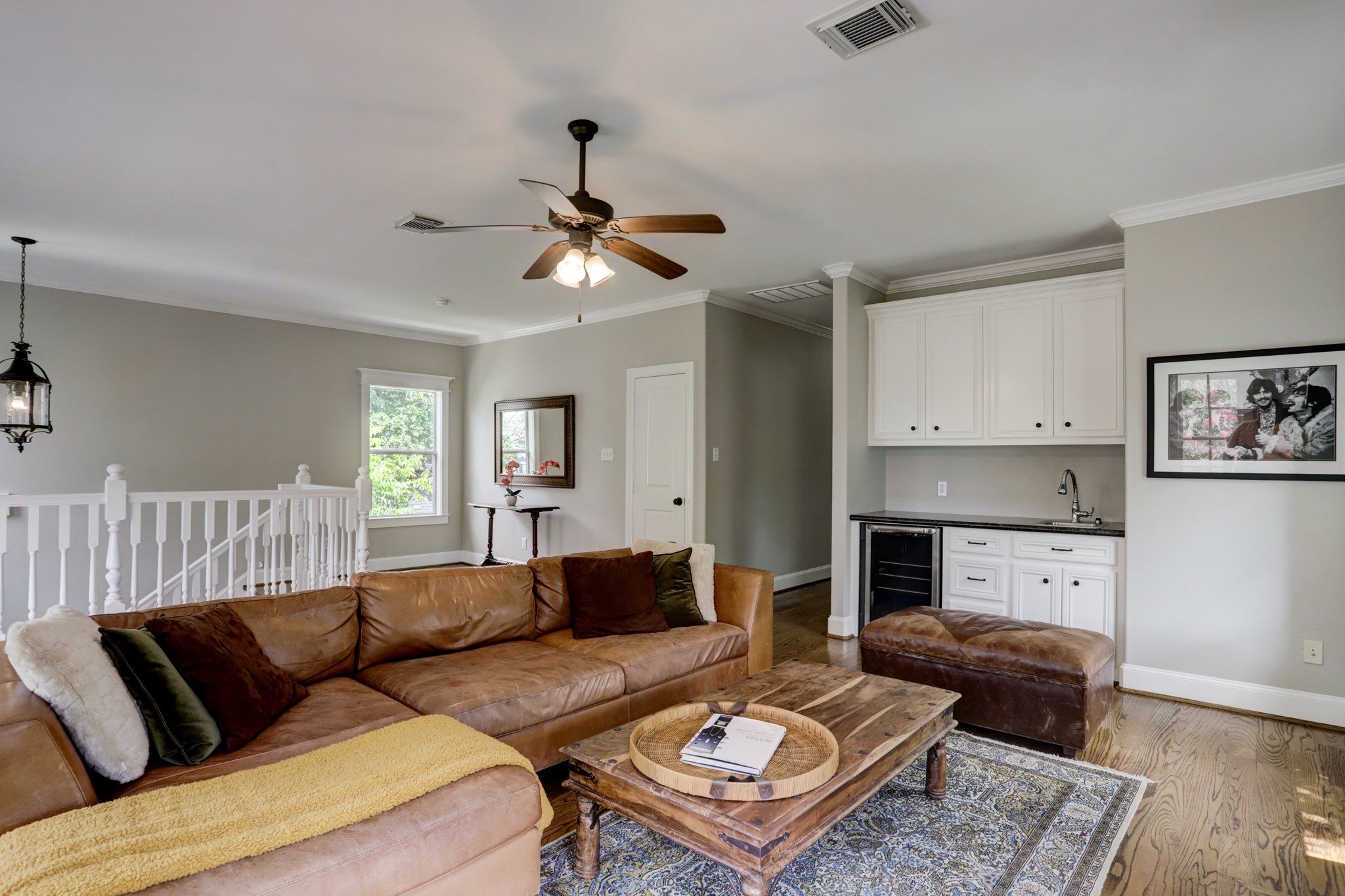 Upstairs flex space or game room is of generous size with wet bar and beverage cooler.