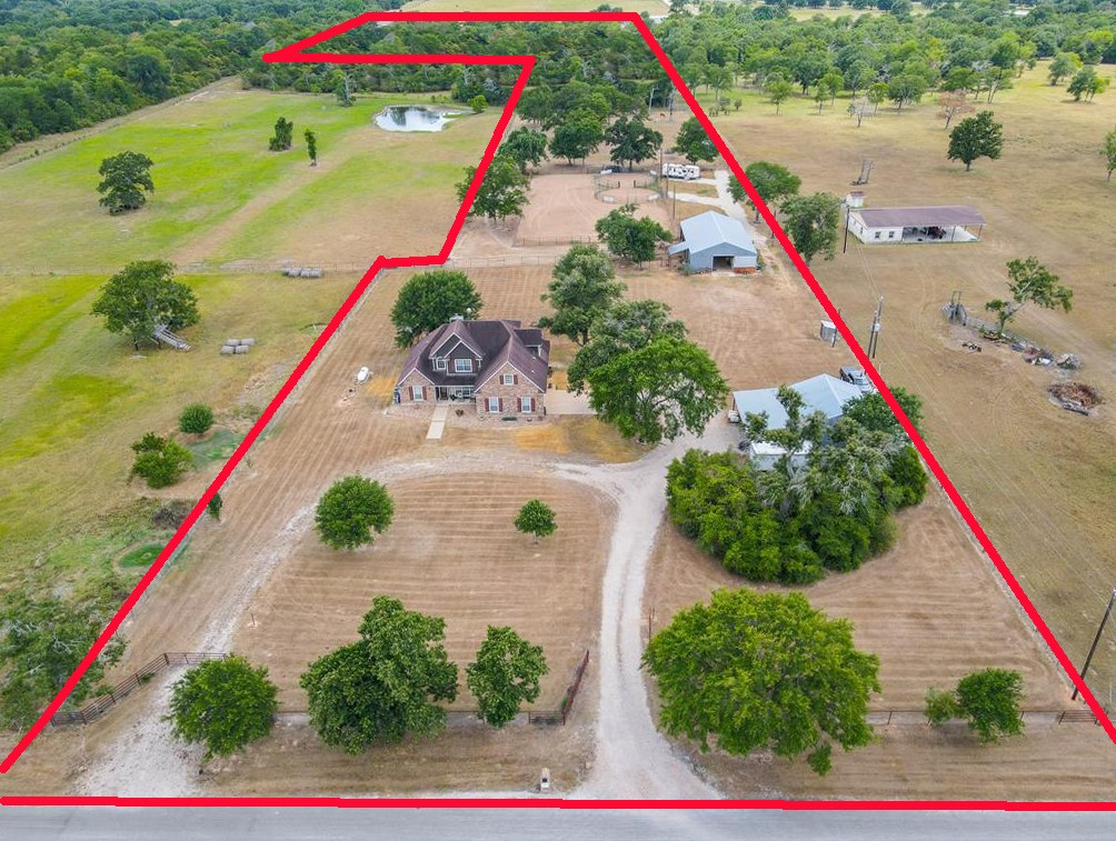 The Red Lines are the approx. location of the proposed boundaries. The Seller owns the property on the left and is negotiable on boundary lines. Approx. 11 to 25 Acres available. Gorgeous approx. Cross-Fenced Equestrian Estate is Move-In Ready. Complete w/a 40x60 Barn w/Living Quarters (Kitchen, Bedroom, Full Bath & W&D Hook-ups), 3-Horse Stalls, Tack Room, 4-FFA/4-H Pen Stalls, Loft Storage, Approx. 100x200 Riding Arena, 2 RV/Trailer Hook-Ups w/Septic, Water & Electric, plus a 30x40 Storage/Workshop Bldg.