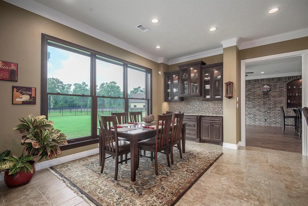 Breakfast / Dining area with back yard views and butlers pantry. Ample room for a larger table.