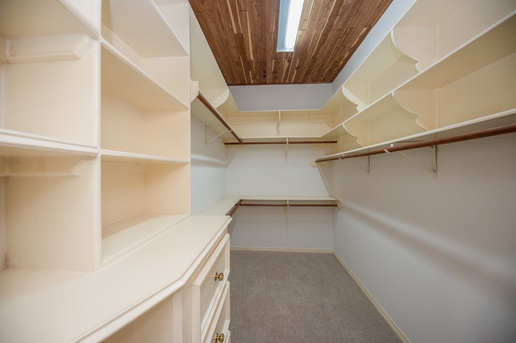 2 primary closets with cedar ceilings.