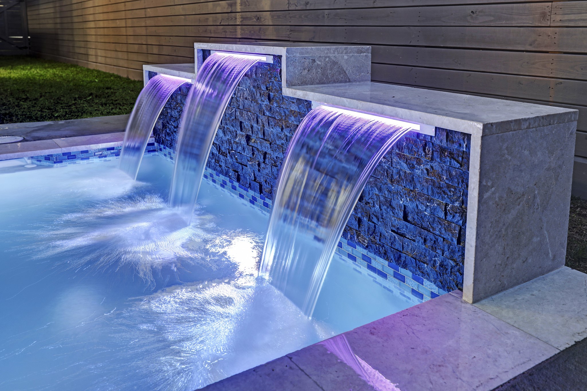 You'll enjoy the beautiful dipping pool with water features that add soothing sounds to the space.