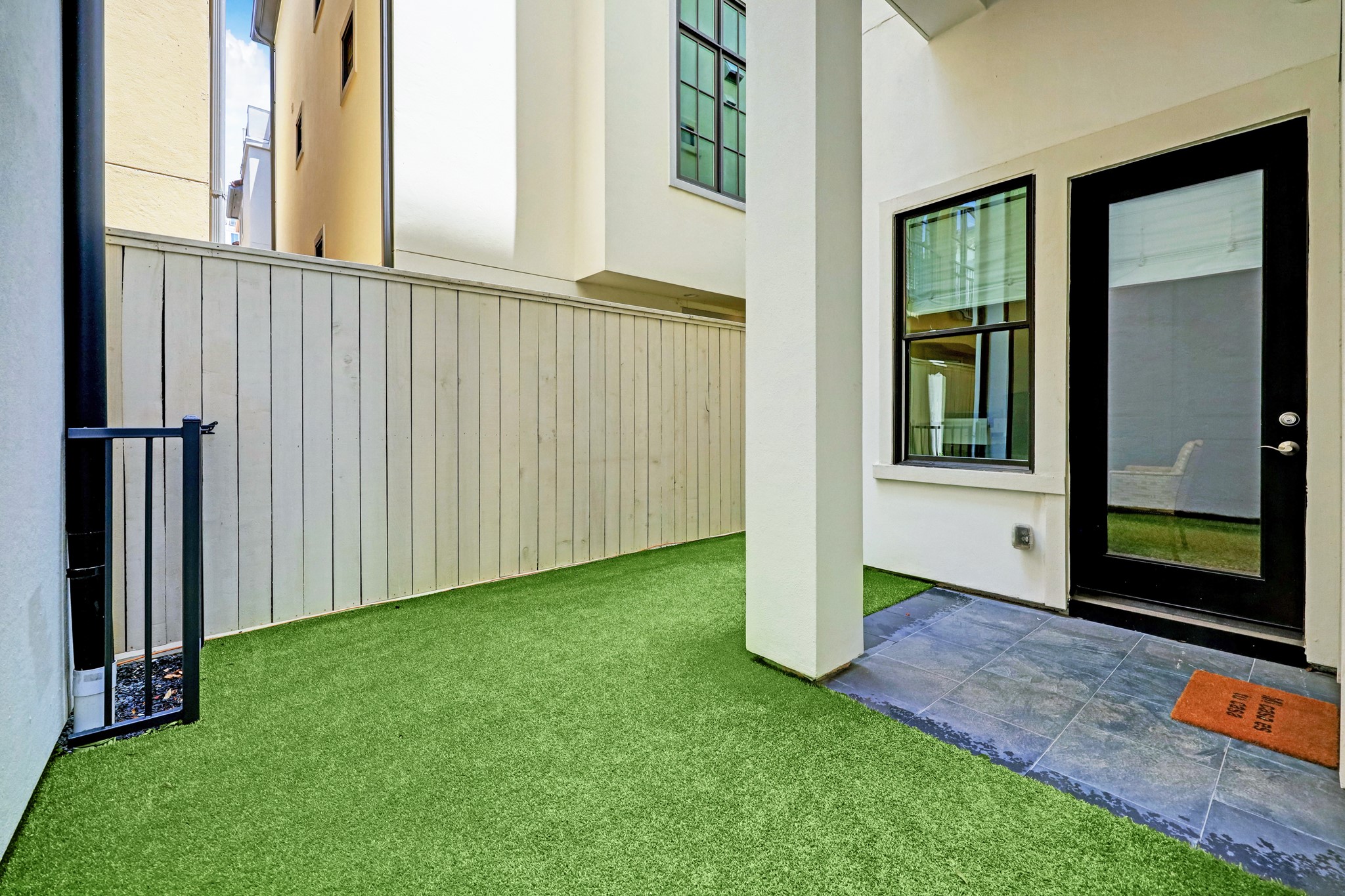 The turfed backyard is the perfect space for pets to roam or a place to entertain guests.