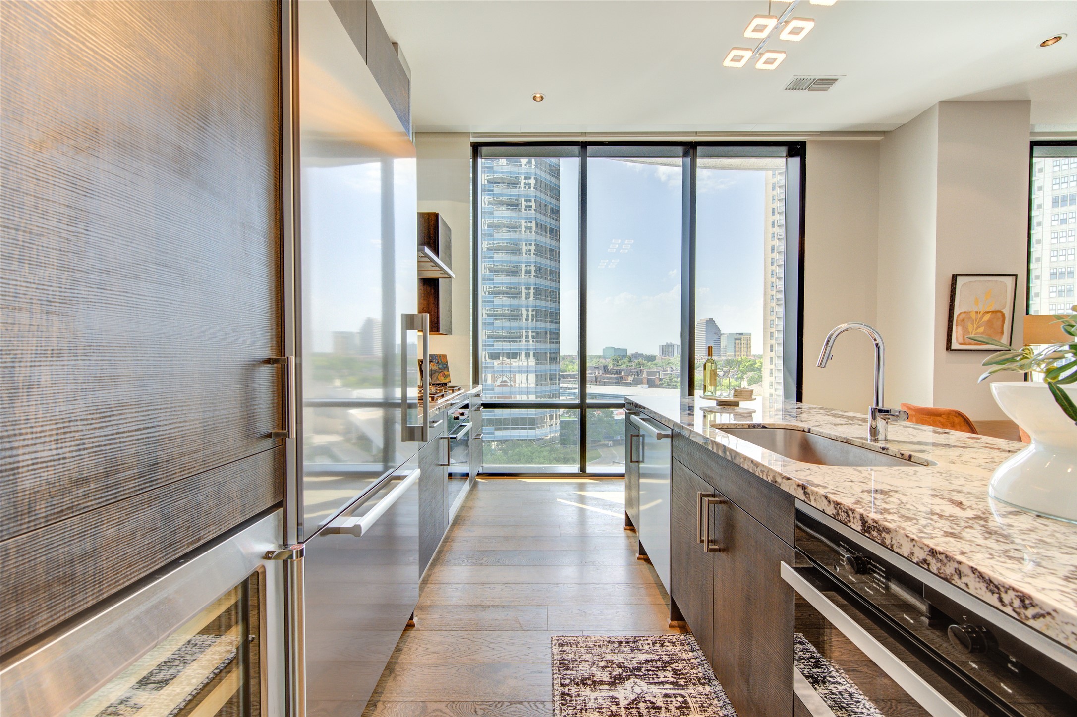 Take a look at the views from this gourmet kitchen complete with top of the line appliances. Entertain in style in this luxurious 2 bedroom high rise.