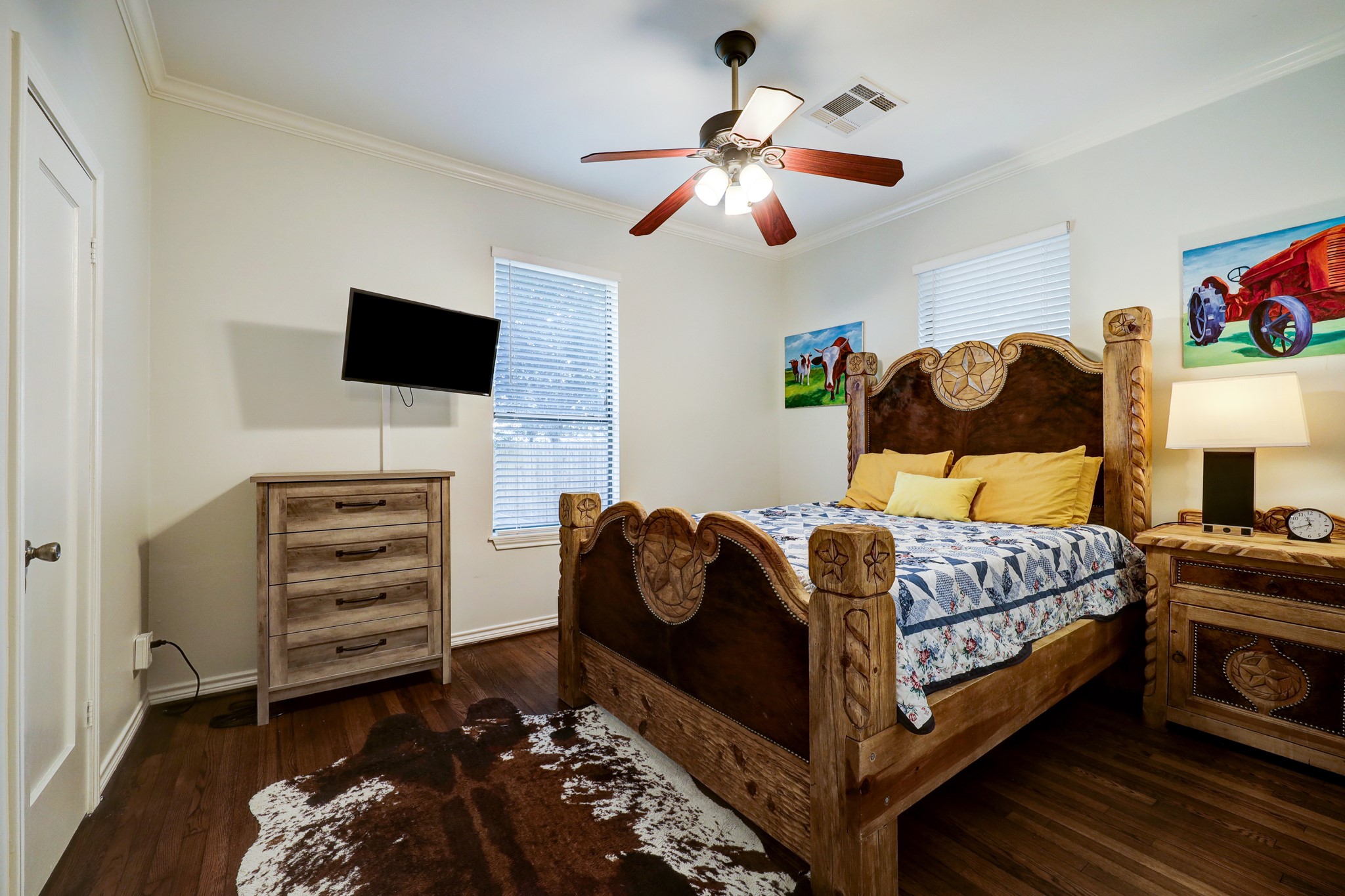Large primary bedroom with en suite bath creates a cozy retreat.