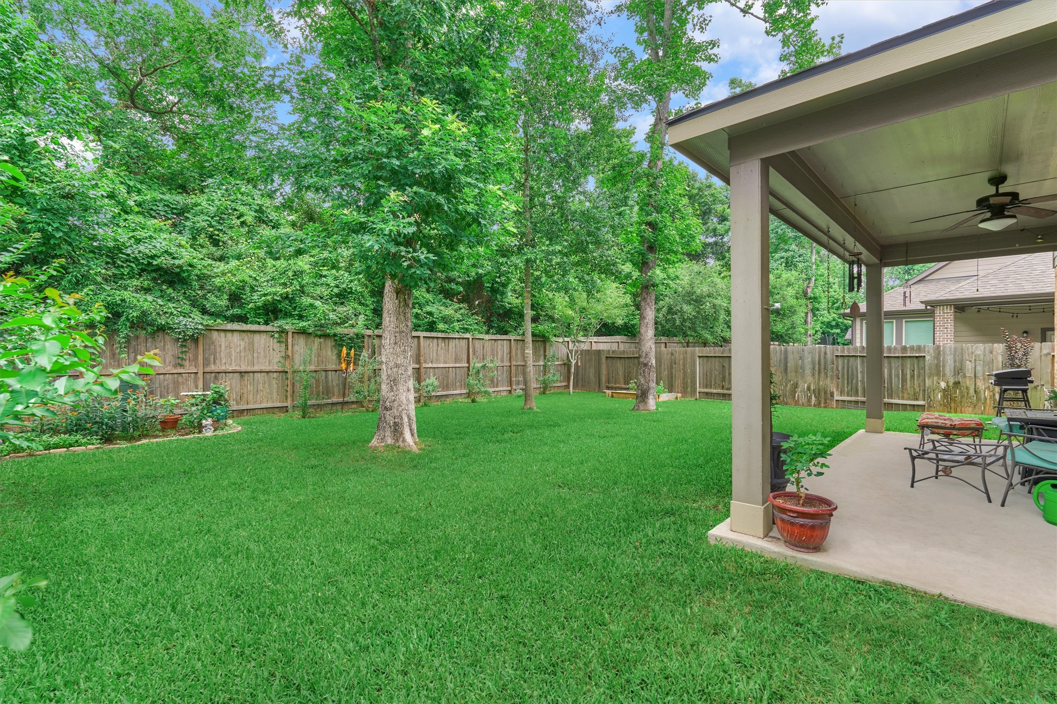The backyard enjoys a wonderful use of space and is great for entertaining!