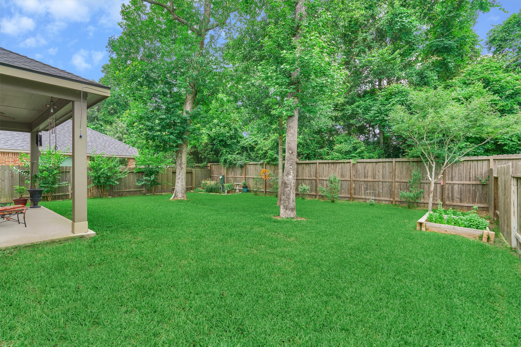 Here we see another view of the back patio. Note the roof was replaced in 2019 and the front and back yard are fully sprinklered.