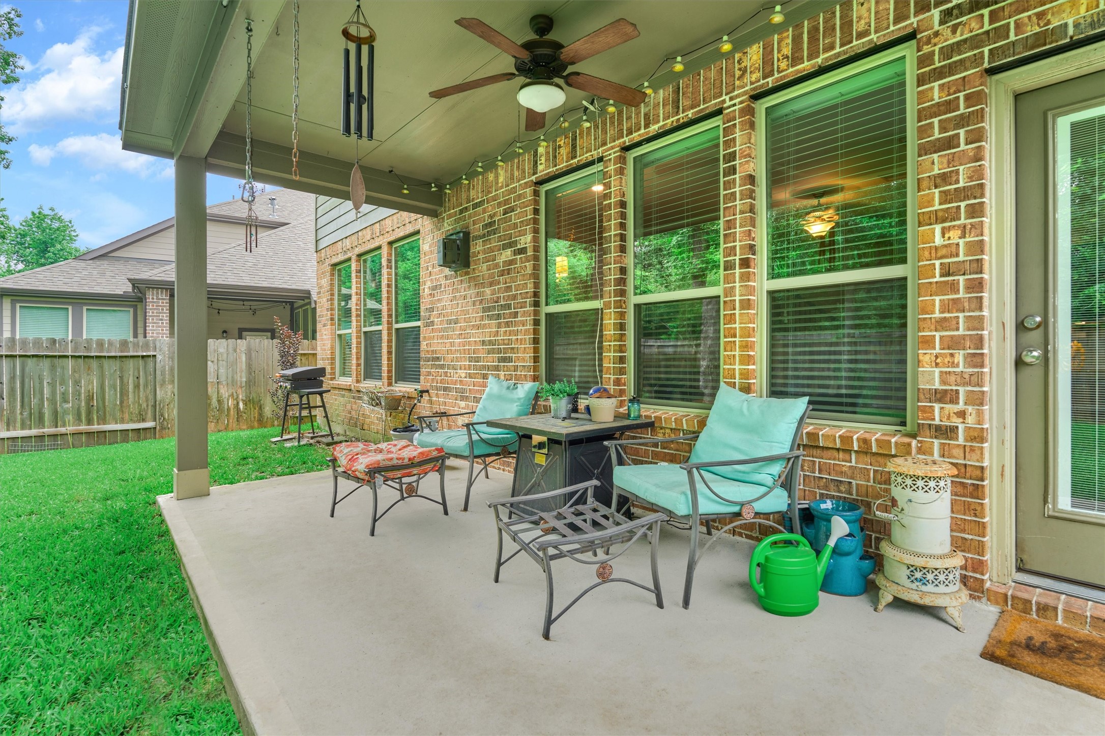 You'll enjoy sitting on your patio with this serene back yard view. Call today for your private viewing!
