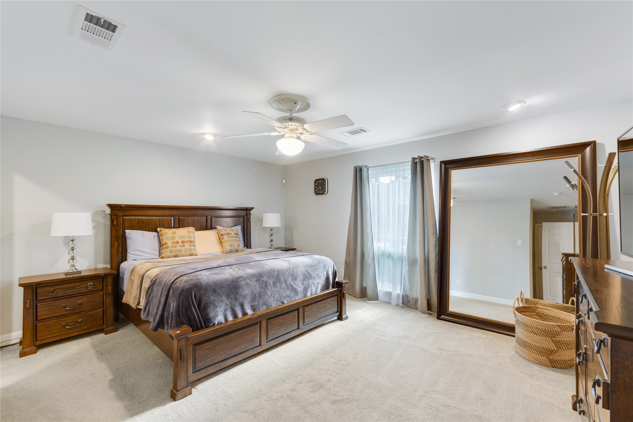 The very spacious master suite is isolated from the other rooms and located in the front of the home.