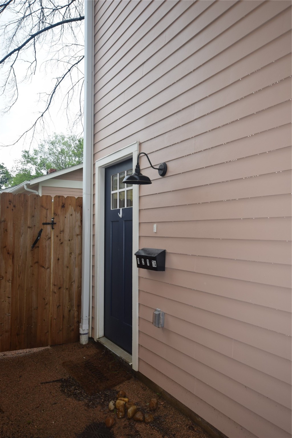 Garage apartment boasts double entry into full laundry room from both backyard and private walkway running from Tulane to Alley.  Walk upstairs to the 2nd floor garage apartment.