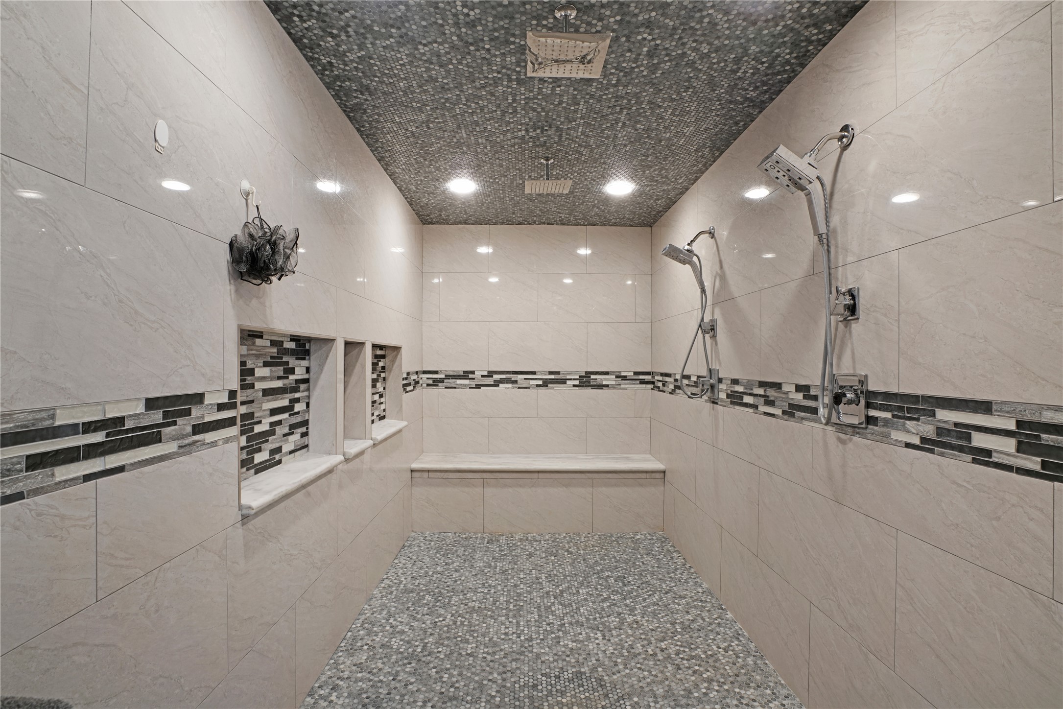 Talk about luxury - oversize shower with multiple rain shower heads.