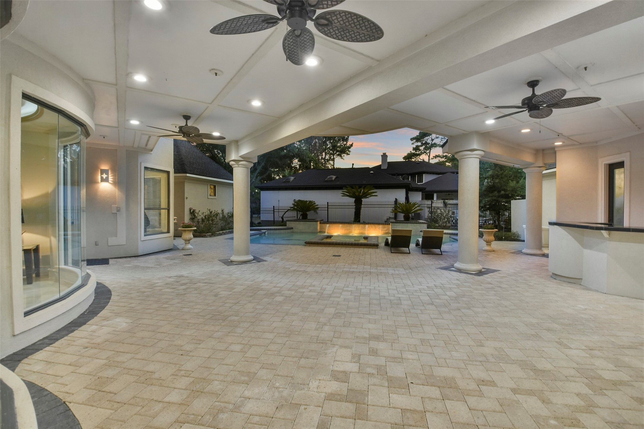 Spacious covered back porch is ideal for hosting parties.