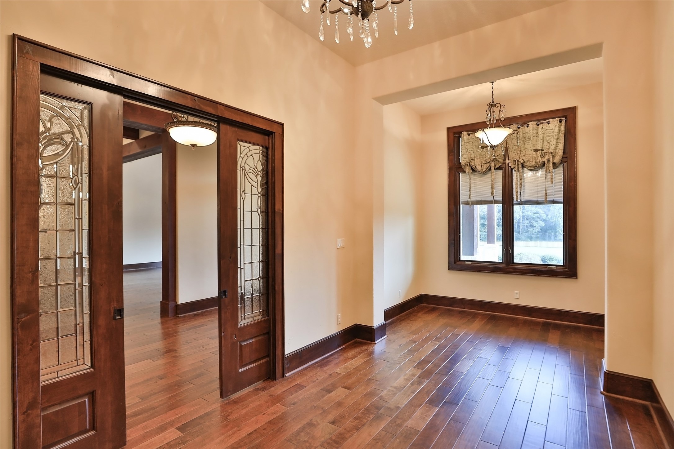 This picture is another view of the music room. Beautiful wood and glass sliding doors provide the privacy you would like.